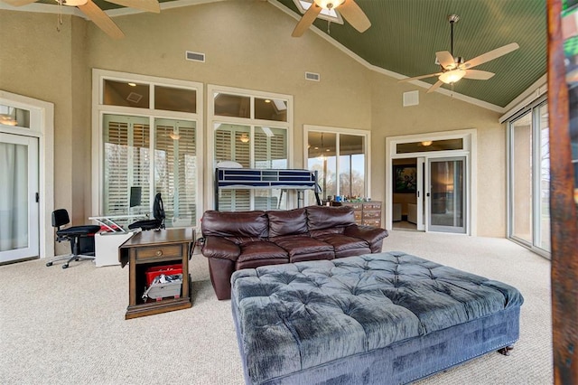 exterior space featuring ceiling fan