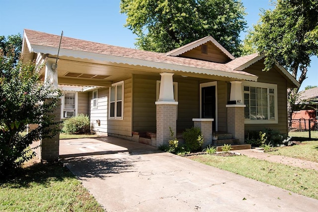 bungalow-style home featuring covered porch