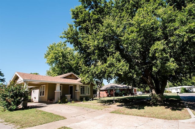 view of front of home with a front yard