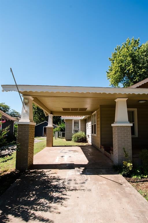 view of parking with a carport