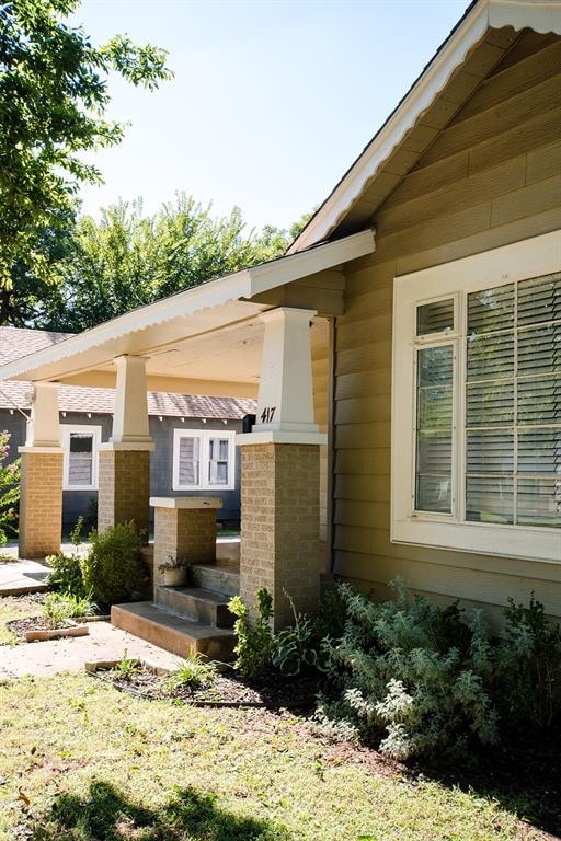 view of home's exterior featuring a porch