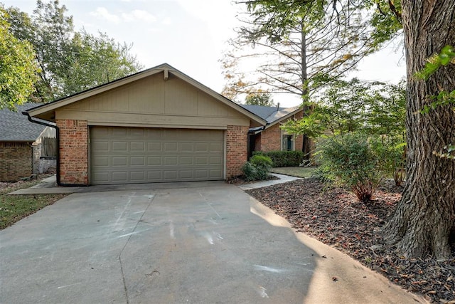 ranch-style home featuring a garage