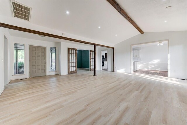 900 Woodbury Dr, Edmond, OK 73034 - unfurnished living room featuring light wood-type flooring