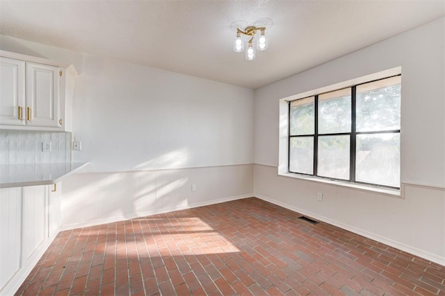 view of unfurnished dining area