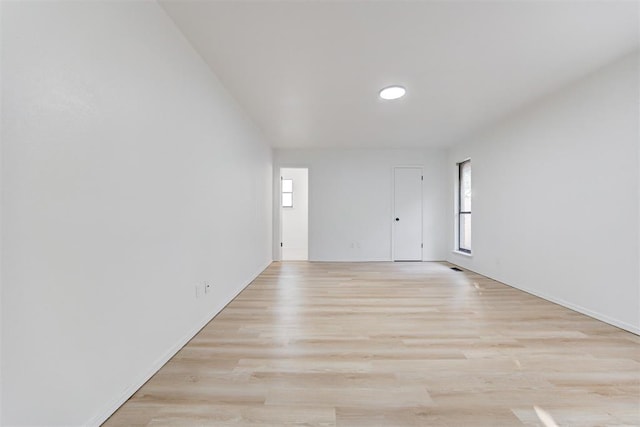 empty room with light wood-type flooring