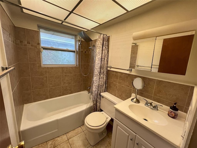 full bathroom with tasteful backsplash, vanity, shower / bathtub combination with curtain, tile patterned flooring, and toilet