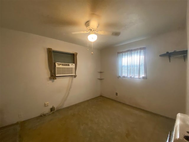 spare room featuring cooling unit, ceiling fan, and carpet