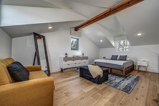 bedroom featuring vaulted ceiling with beams, light hardwood / wood-style flooring, a wall unit AC, and multiple windows