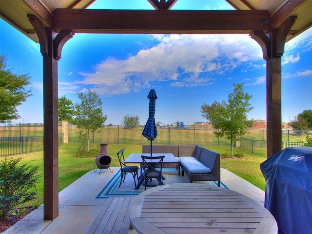 view of patio / terrace featuring a rural view and a grill