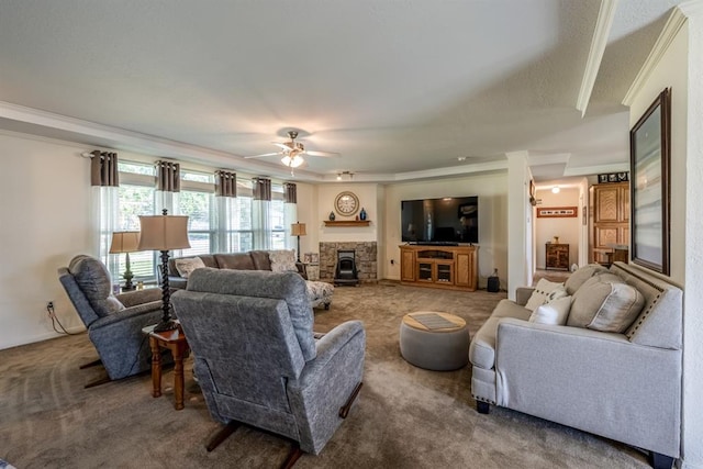 carpeted living room with a wood stove, ceiling fan, and ornamental molding