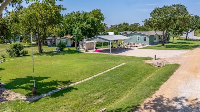 view of yard featuring a carport