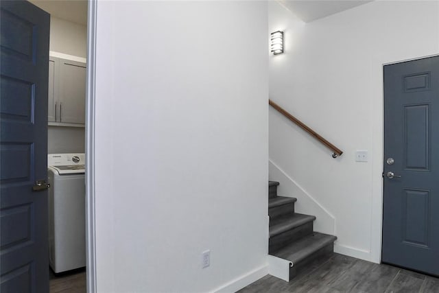 entryway with dark hardwood / wood-style flooring and washer / clothes dryer