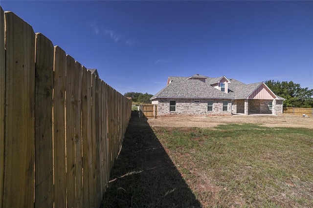 view of home's exterior featuring a lawn