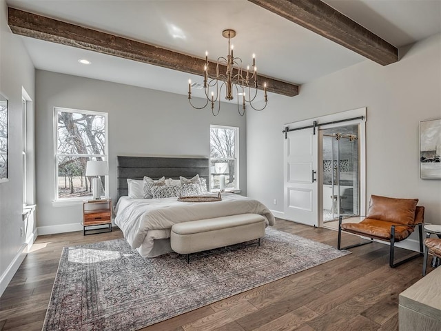 bedroom with baseboards, a barn door, beam ceiling, an inviting chandelier, and dark wood-style flooring