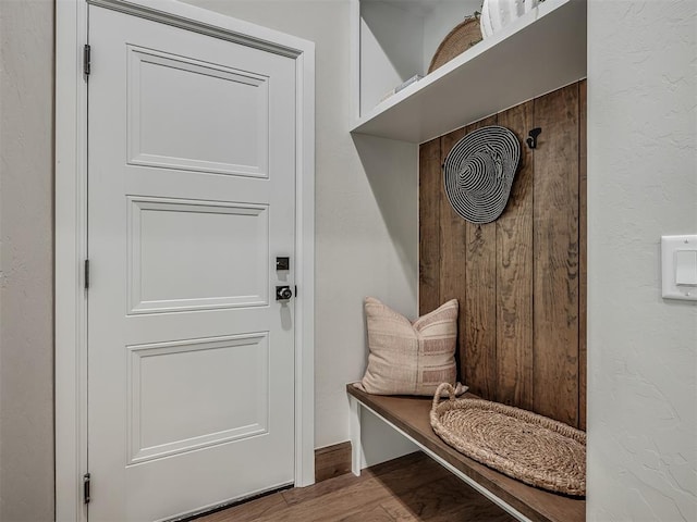 mudroom with wood finished floors