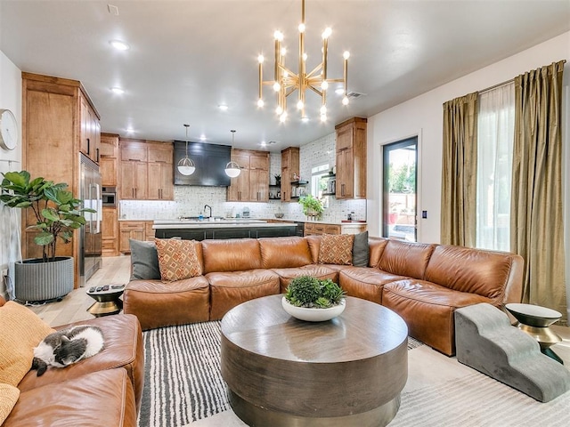 living room featuring a chandelier