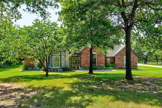 view of front of house with a front lawn