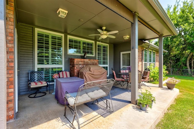 view of patio / terrace featuring ceiling fan