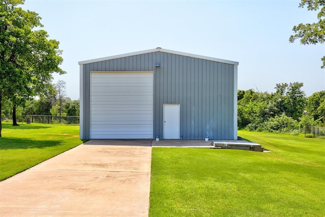 garage with a lawn