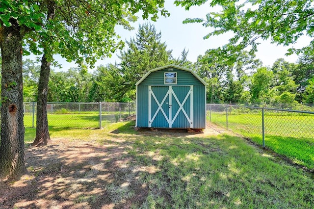 view of outdoor structure with a lawn