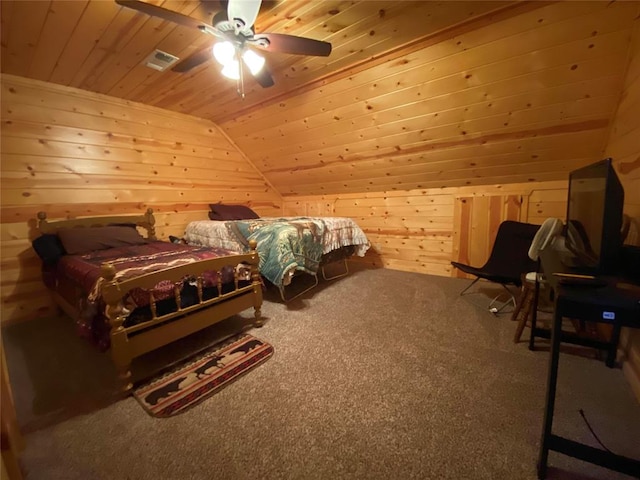 carpeted bedroom with ceiling fan, wood walls, lofted ceiling, and wood ceiling