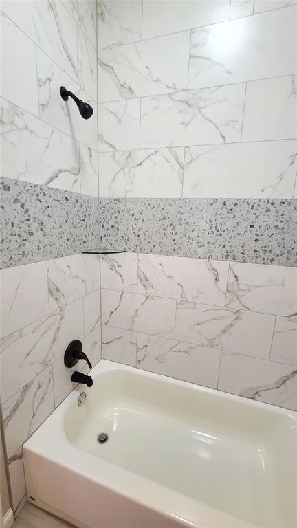 1308 W Harvard Way, Mustang, OK 73064 - bathroom with bathing tub / shower combination