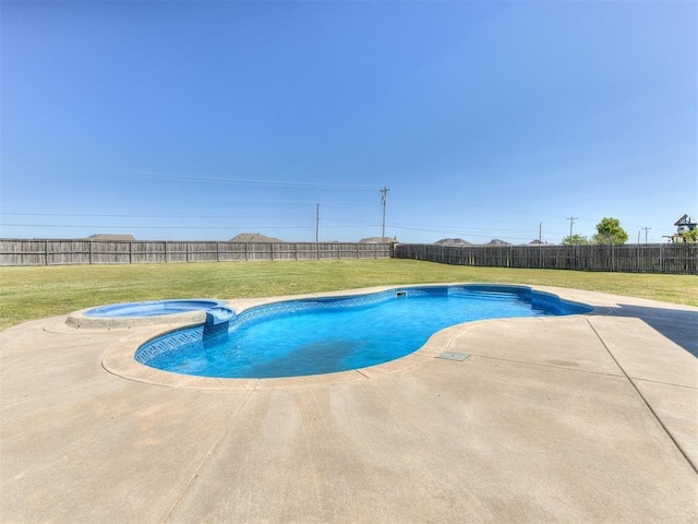 view of pool featuring a lawn, a patio area, and an in ground hot tub