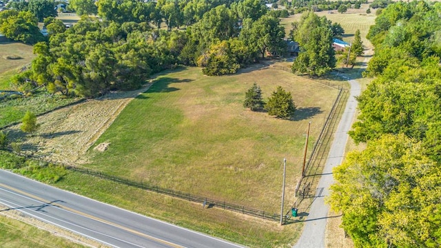 birds eye view of property with a rural view