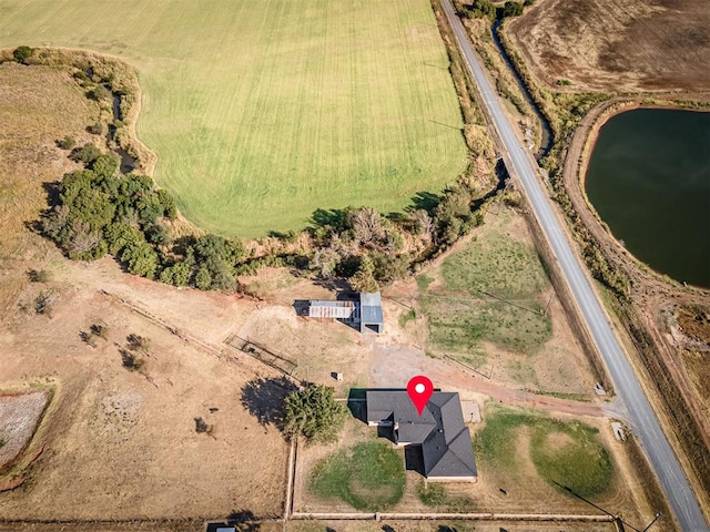 bird's eye view with a rural view and a water view