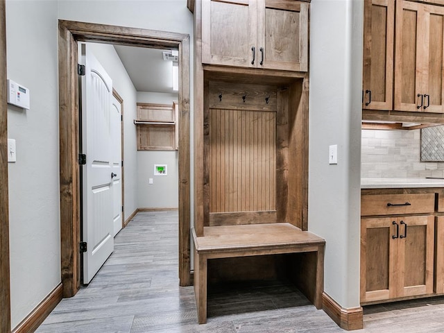 mudroom with light wood-type flooring