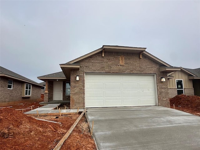 single story home with a garage