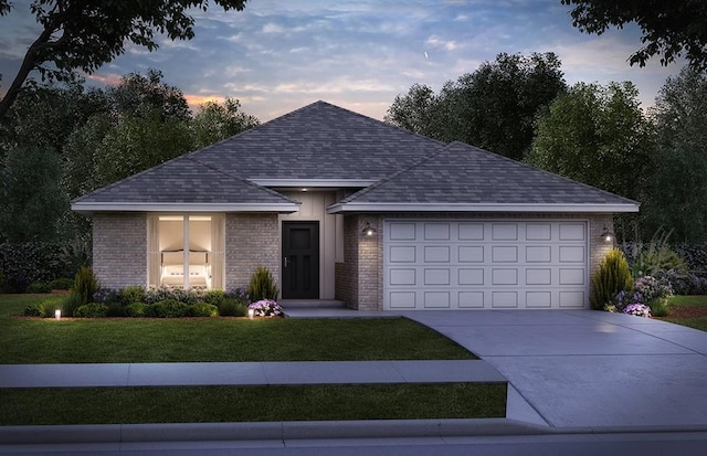 view of front of property with brick siding, a shingled roof, a front yard, a garage, and driveway