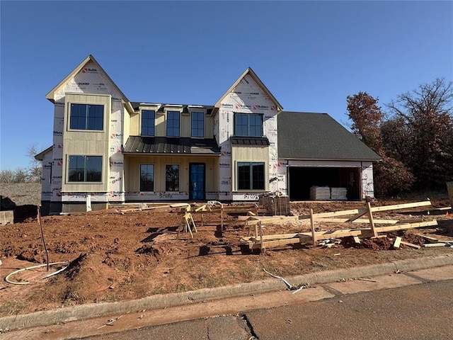 property in mid-construction with a garage