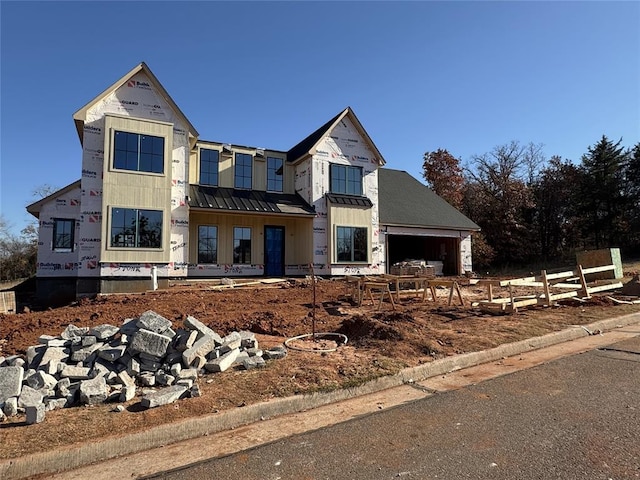 property under construction with a garage