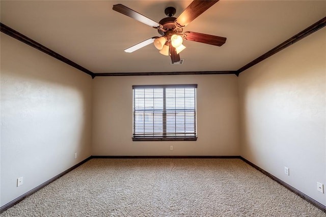 empty room with carpet, ceiling fan, and ornamental molding