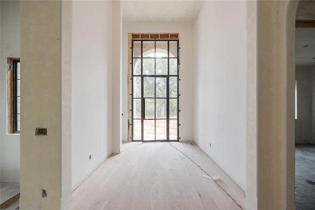 corridor featuring light wood-type flooring