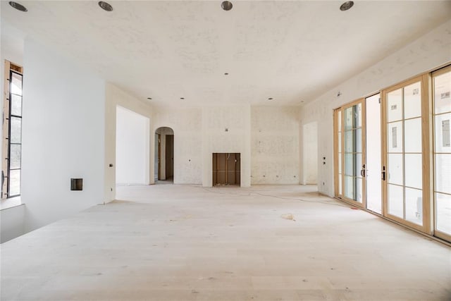 unfurnished room featuring a wealth of natural light