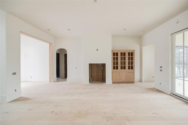 unfurnished room featuring light wood-type flooring