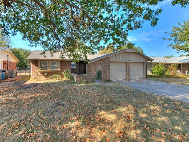 ranch-style house featuring a garage