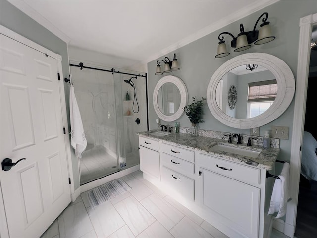 bathroom featuring vanity, walk in shower, and crown molding