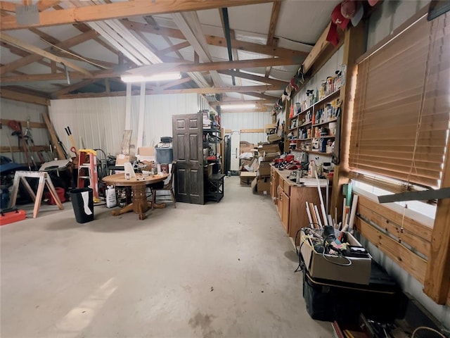 garage with a workshop area