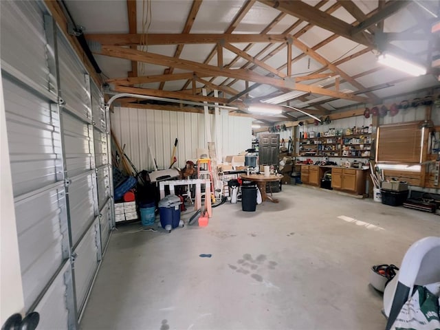 garage with a workshop area