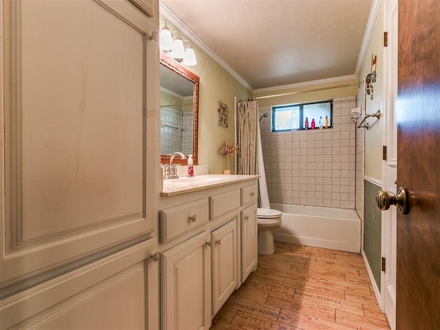 full bathroom featuring shower / bath combo, crown molding, toilet, vanity, and hardwood / wood-style flooring