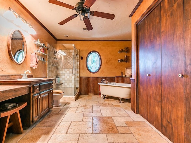 full bathroom with ceiling fan, separate shower and tub, crown molding, and vanity