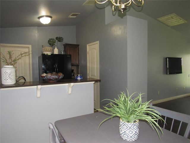 1617 NW 144th Ter, Edmond, OK 73013 - dining room featuring a chandelier