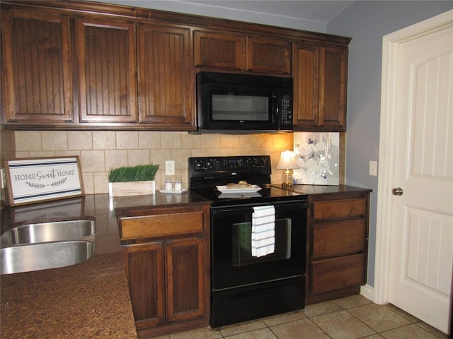 1617 NW 144th Ter, Edmond, OK 73013 - kitchen featuring black appliances, tasteful backsplash, and light tile patterned floors