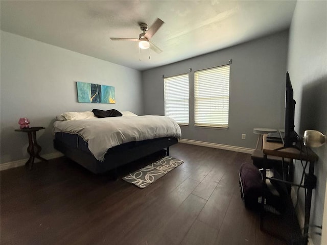 1617 NW 144th Ter, Edmond, OK 73013 - bedroom featuring wood finished floors and a ceiling fan