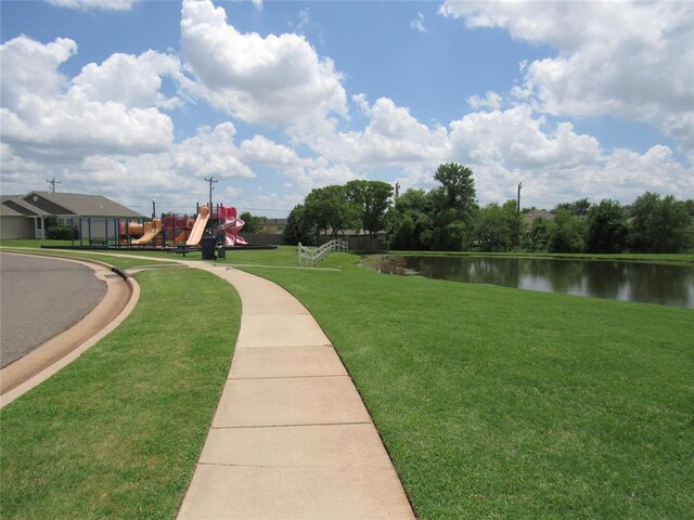 1617 NW 144th Ter, Edmond, OK 73013 - view of home's community with a water view and a yard