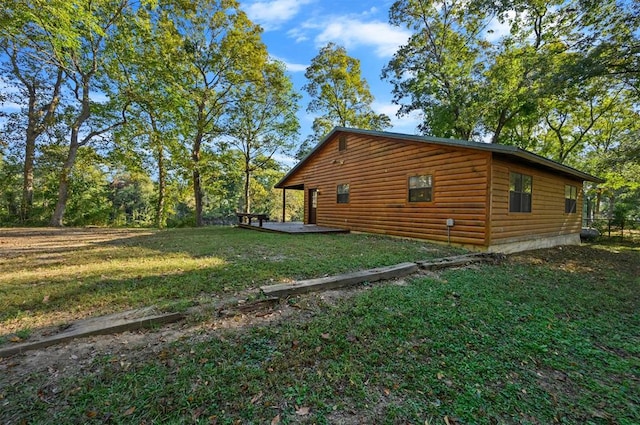 view of home's exterior featuring a yard