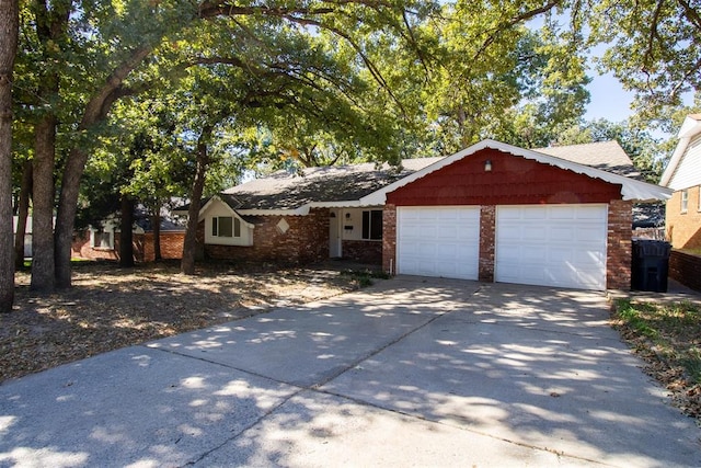 ranch-style house featuring a garage